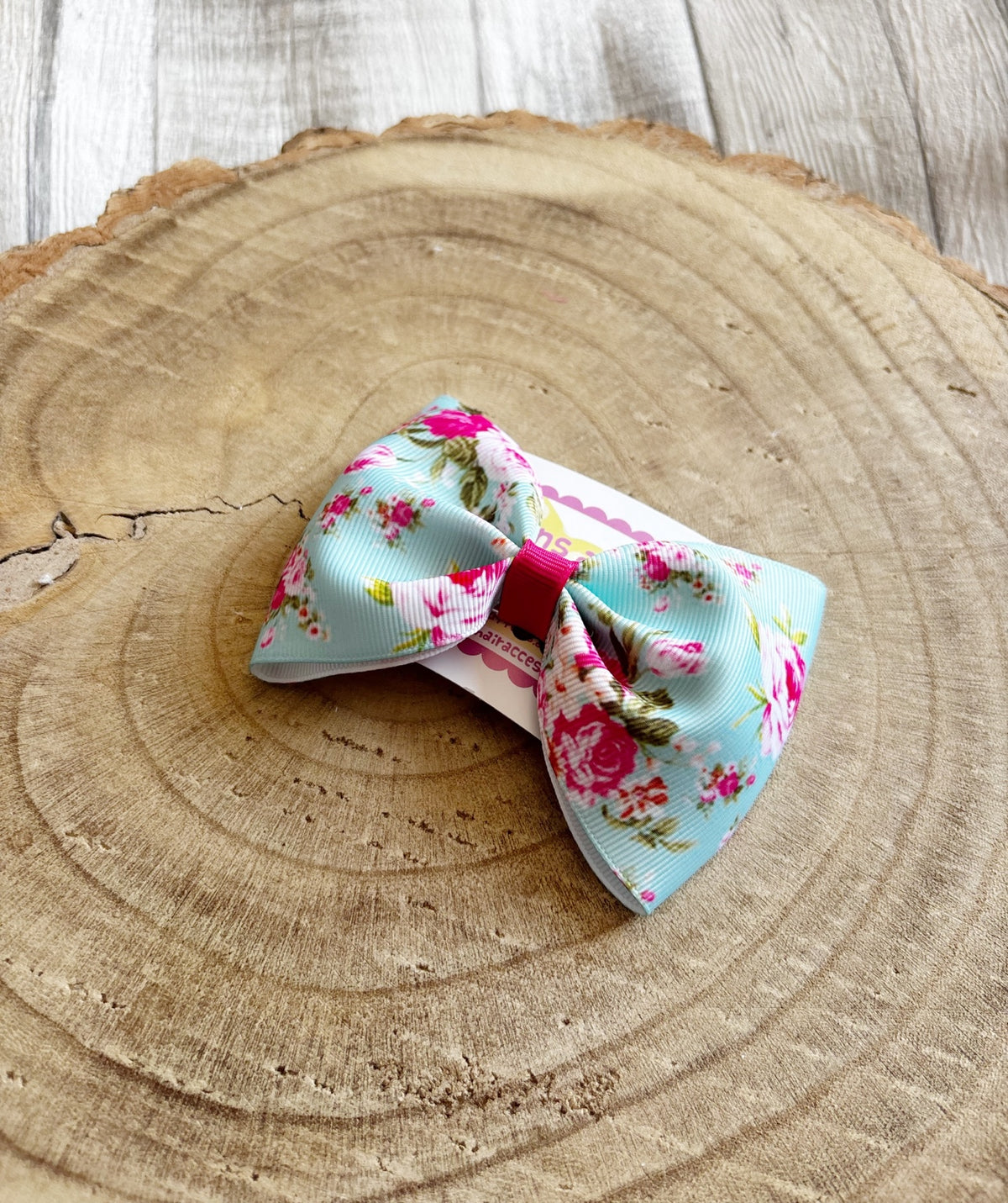 Blue and pink floral single handmade hair bow by Buttons and Bows