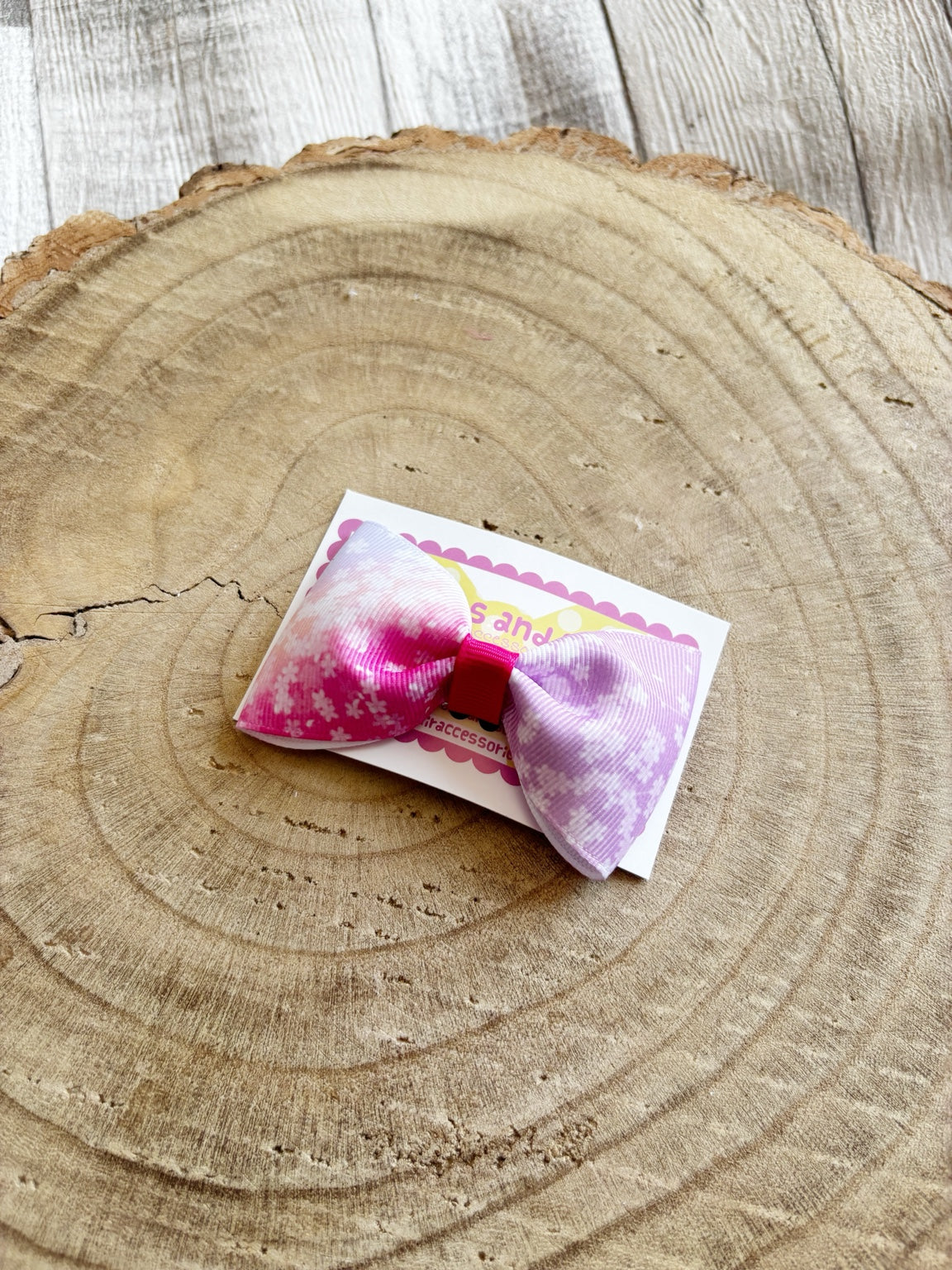 Pink and purple floral single bow hair clip handmade by Buttons and Bows