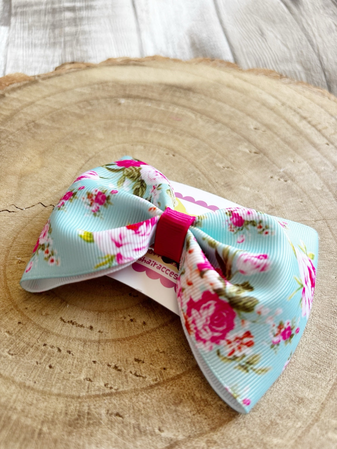 Blue and pink floral single handmade hair bow by Buttons and Bows