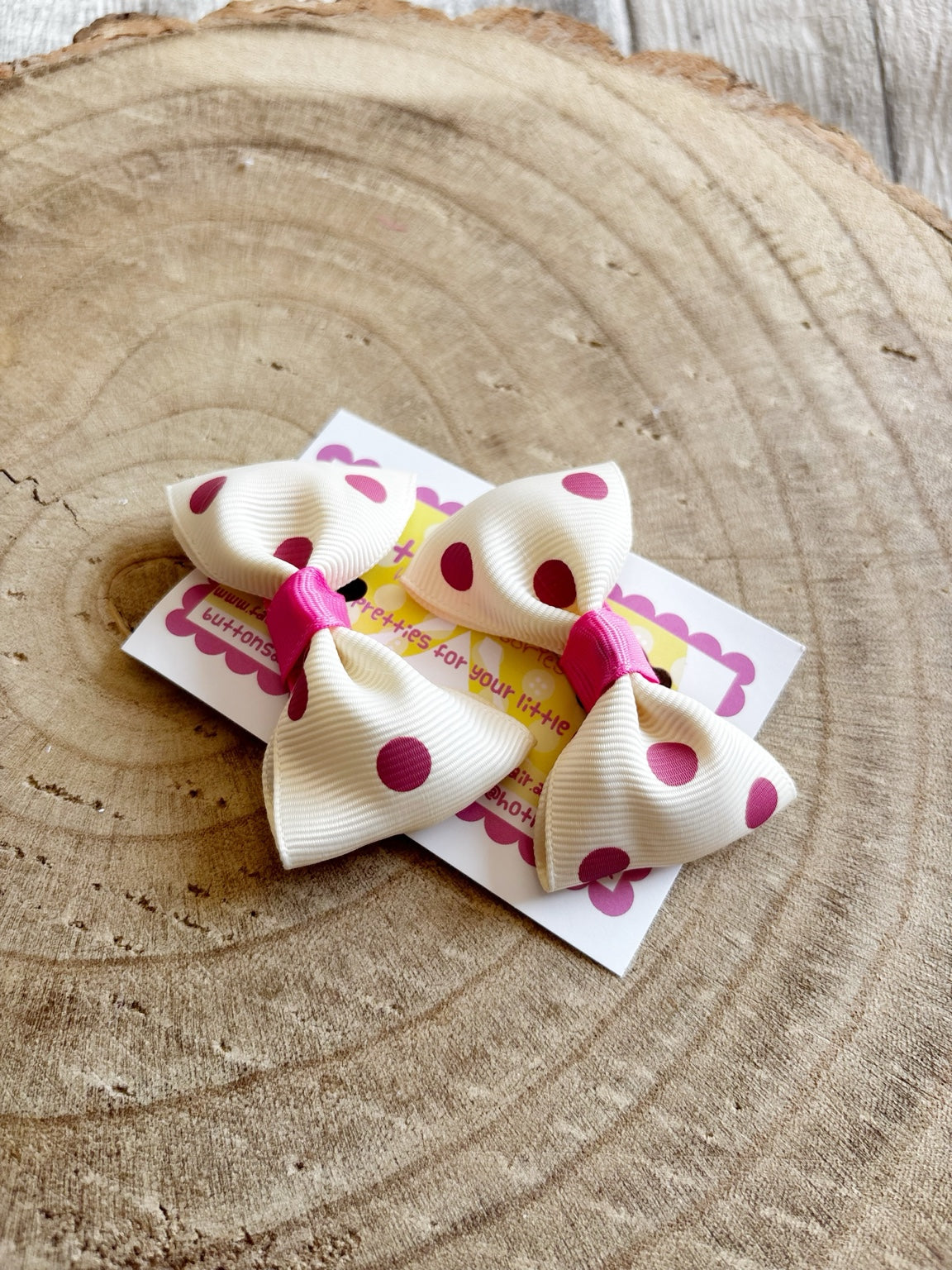 Cream and pink polka dot handmade bow set by Buttons and Bows