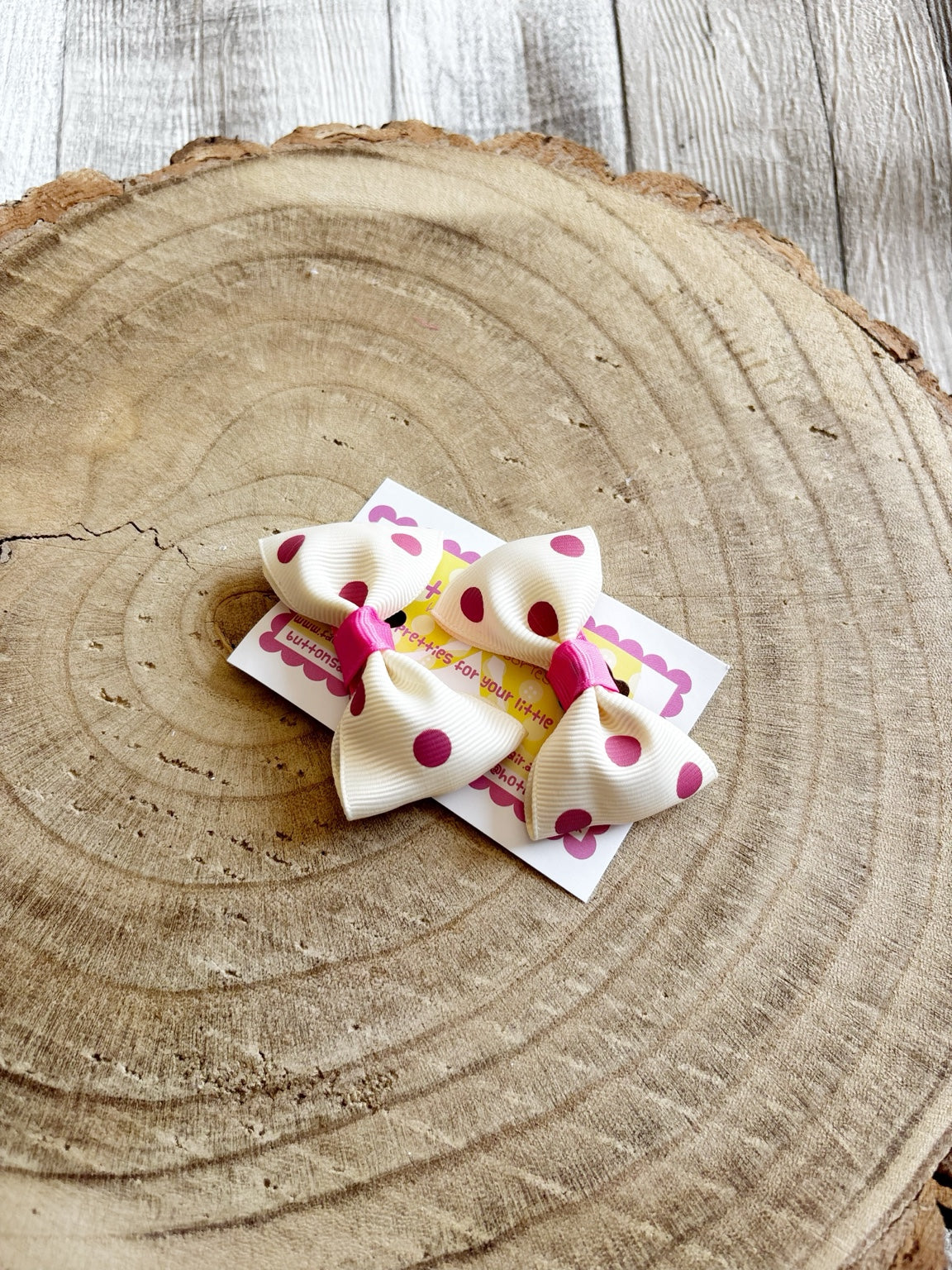 Cream and pink polka dot handmade bow set on display card
