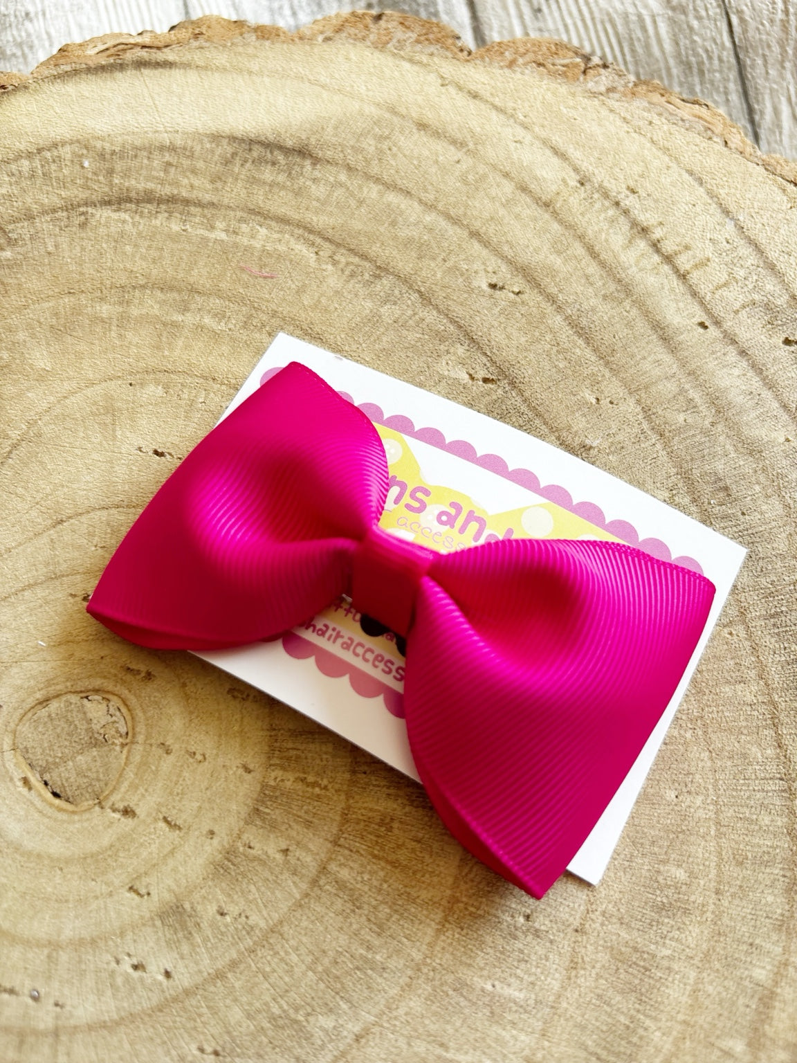 Hot pink handmade single hair bow by Buttons and Bows