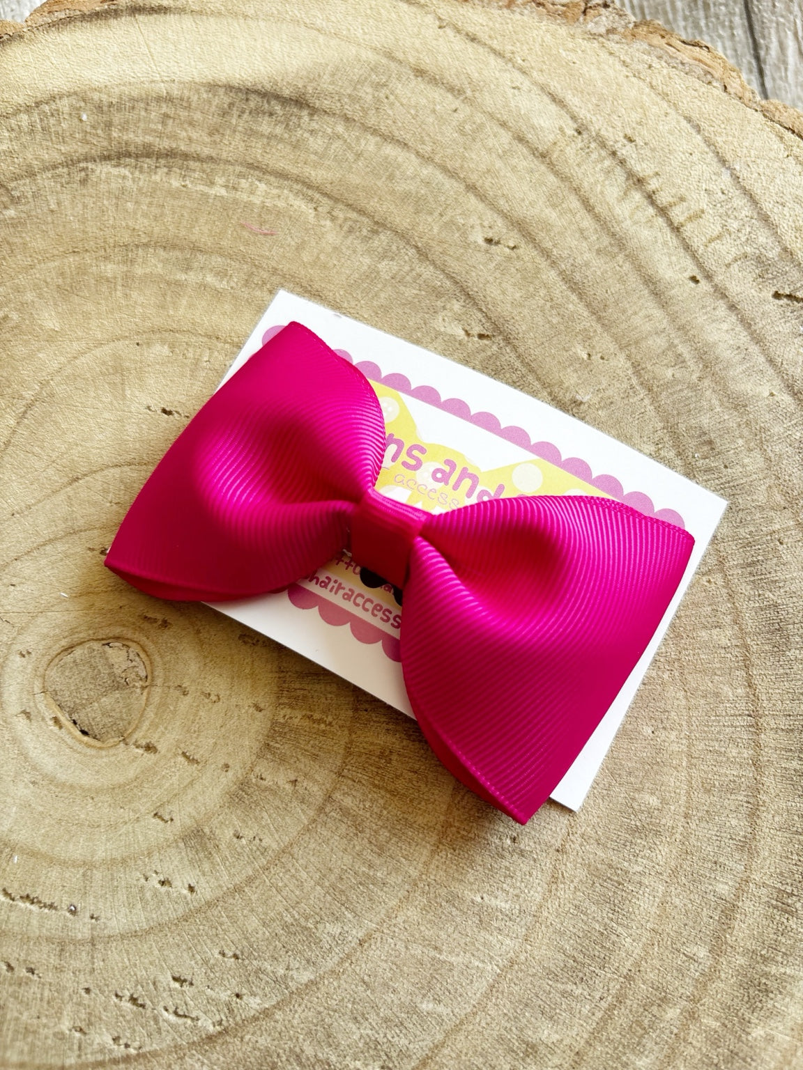 Hot pink grosgrain single hair bow handmade by Buttons and Bows