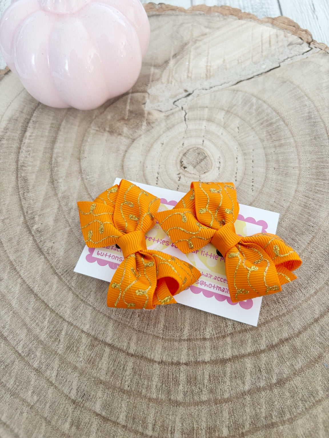 Orange and gold Halloween bow set handmade by Buttons and Bows view 2