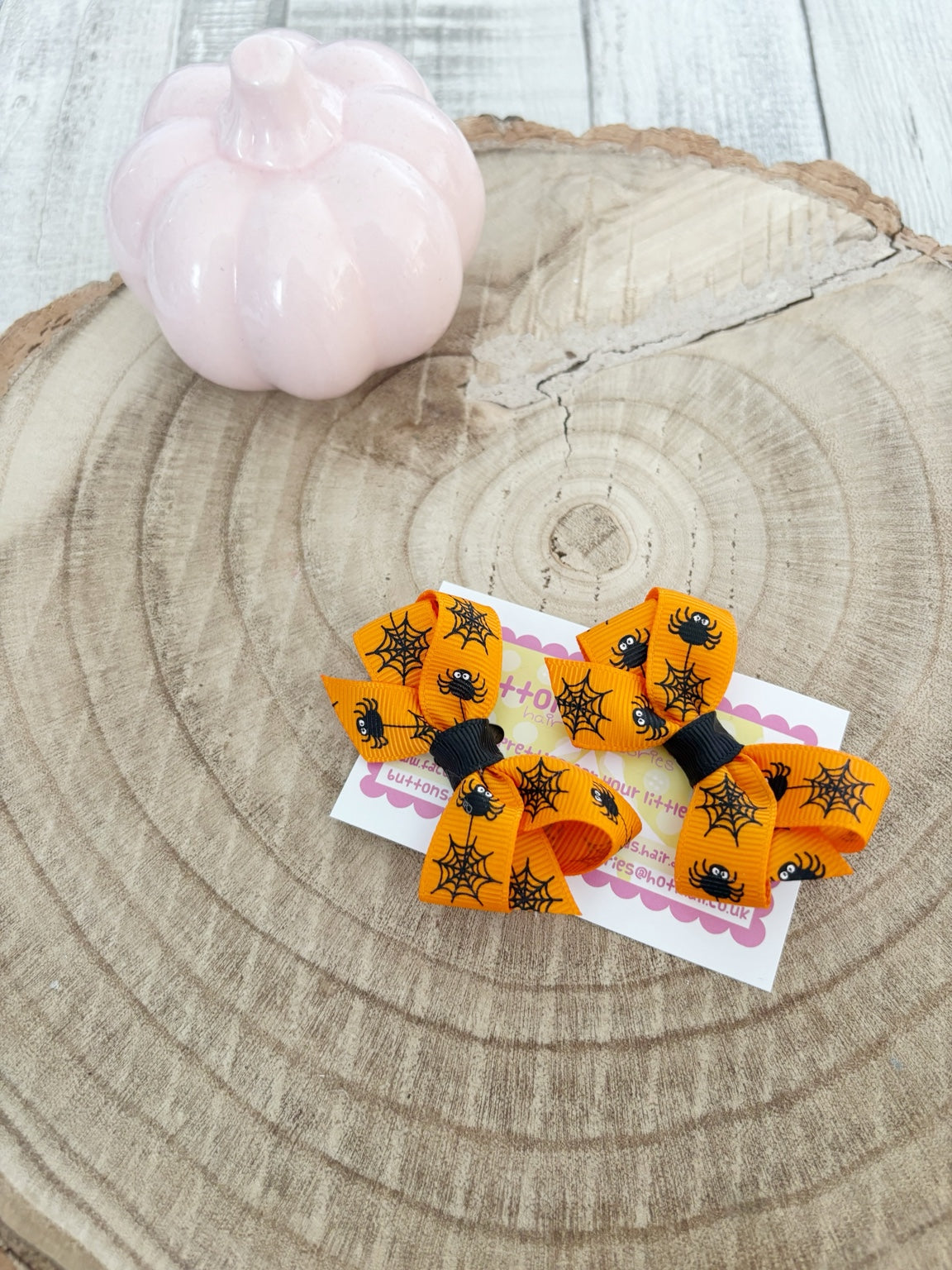 Orange spider and web Halloween bow set handmade by Buttons and Bows