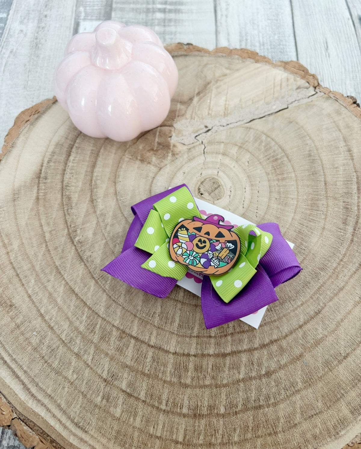 Purple and green Halloween candy pumpkin single bow handmade by Buttons and Bows