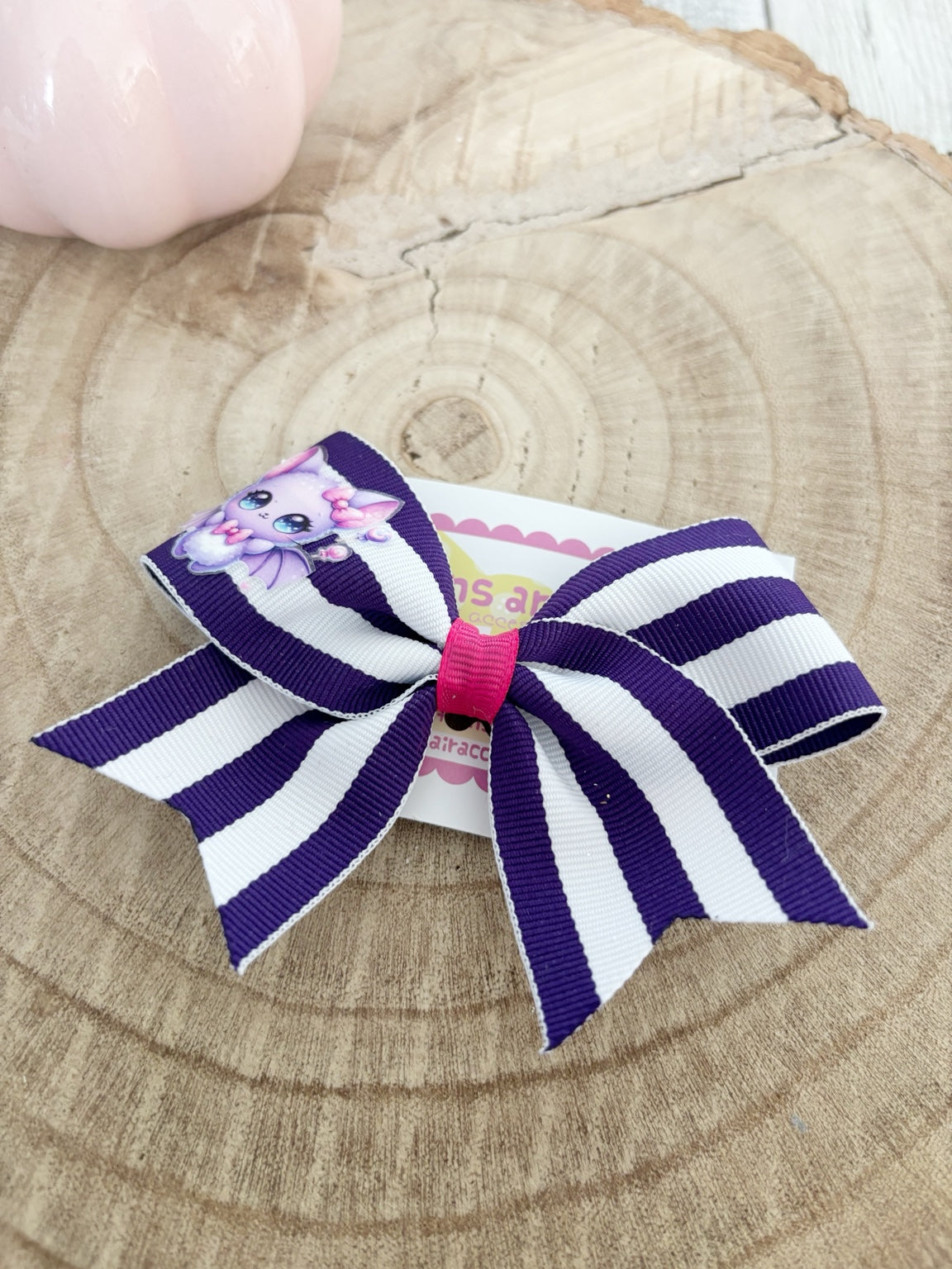 Purple and white striped Halloween single bow handmade by Buttons and Bows